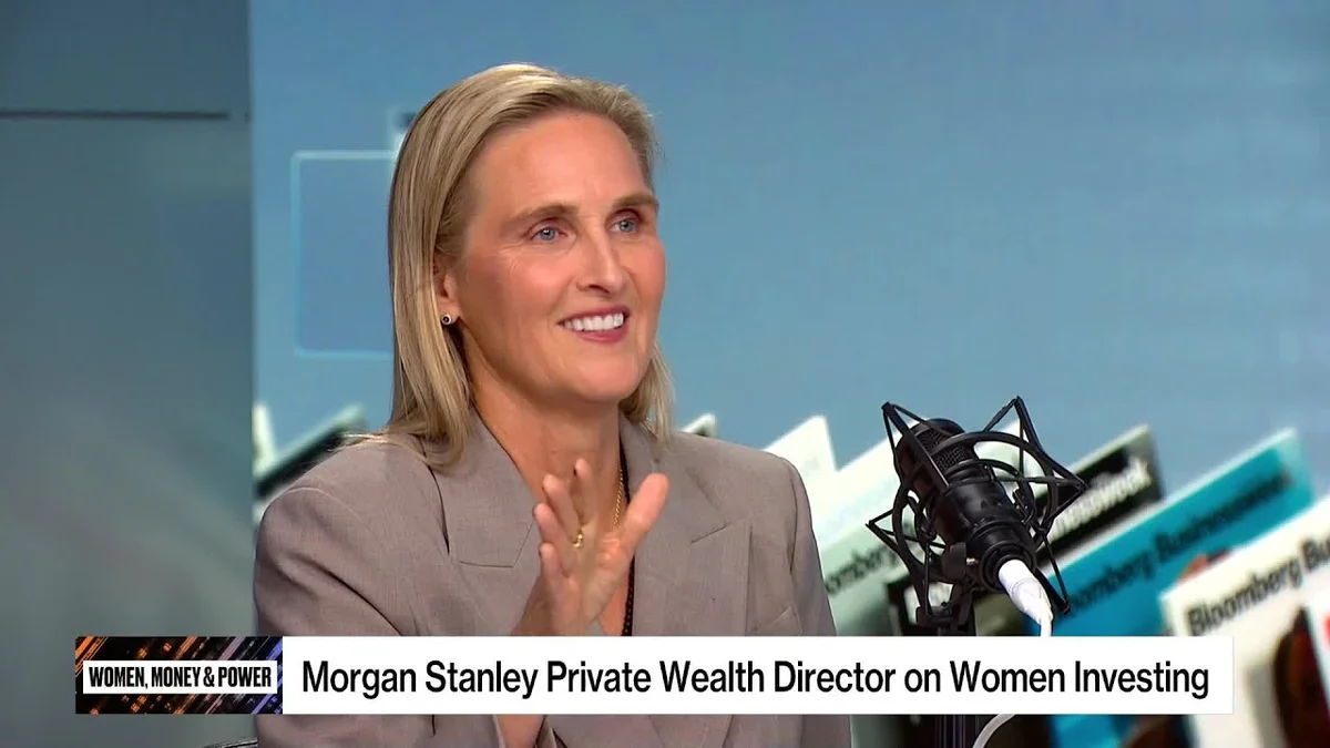 Sherry Paul speaking at a panel discussion on Women, Money & Power.