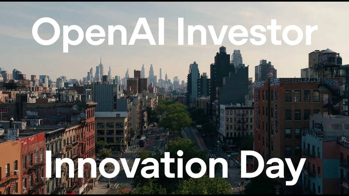 Aerial view of a city skyline with 'OpenAI Investor Innovation Day' text overlay.