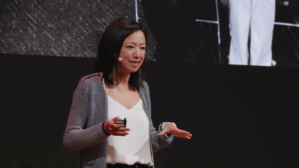 Stacie Faggioli, Business Finance Officer, Applications at OpenAI, speaking on stage.