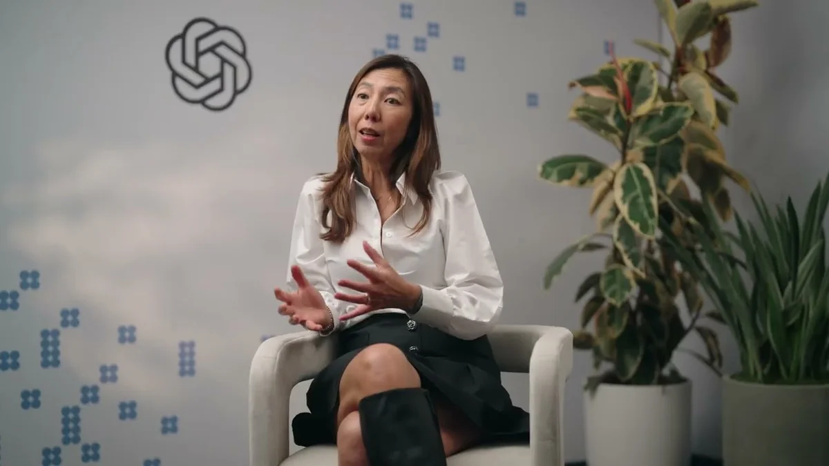 Fiona Tan, CTO of Wayfair, speaking in an interview setting with OpenAI branding.