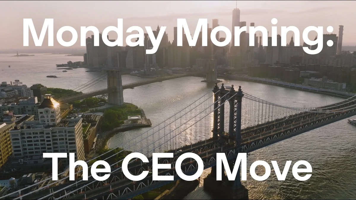 Tom Eggemeier, CEO of Zendesk, speaks in front of a city skyline.