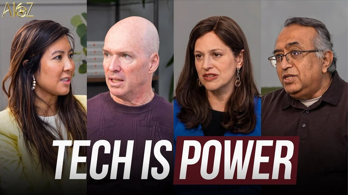 Four people sitting around a round table with microphones, discussing technology.