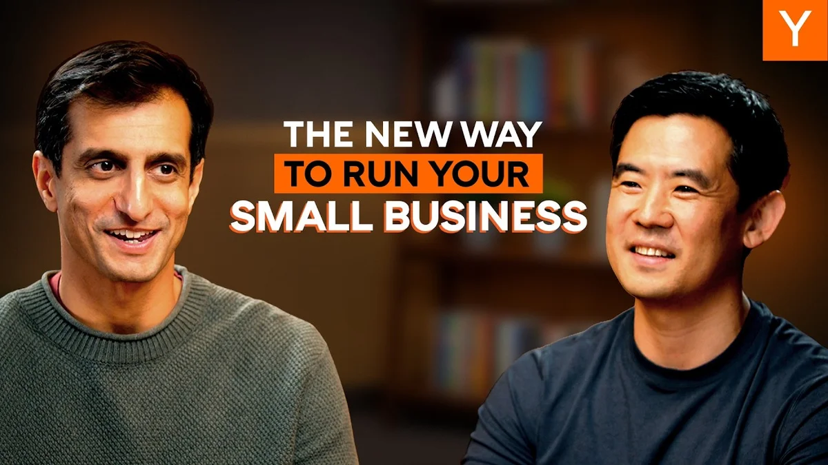Harj Taggar and Eddie Kim sitting at a table discussing Gusto's AI product "Cofounder."