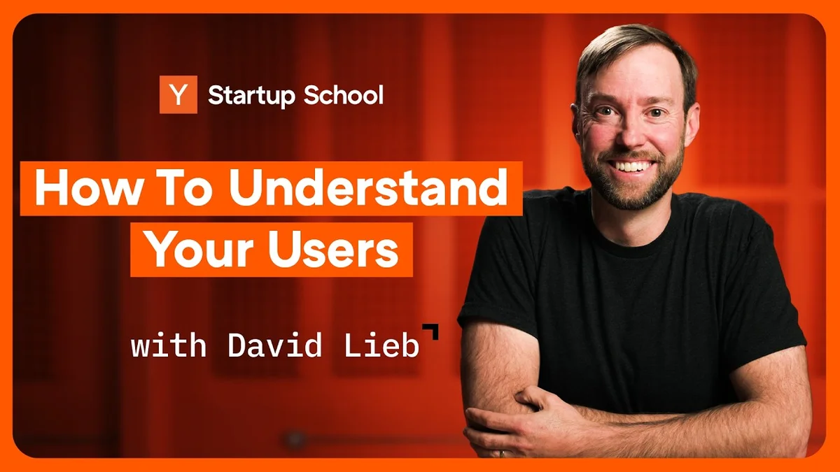 David Lieb, General Partner at Y Combinator, speaking in front of a red, textured background.