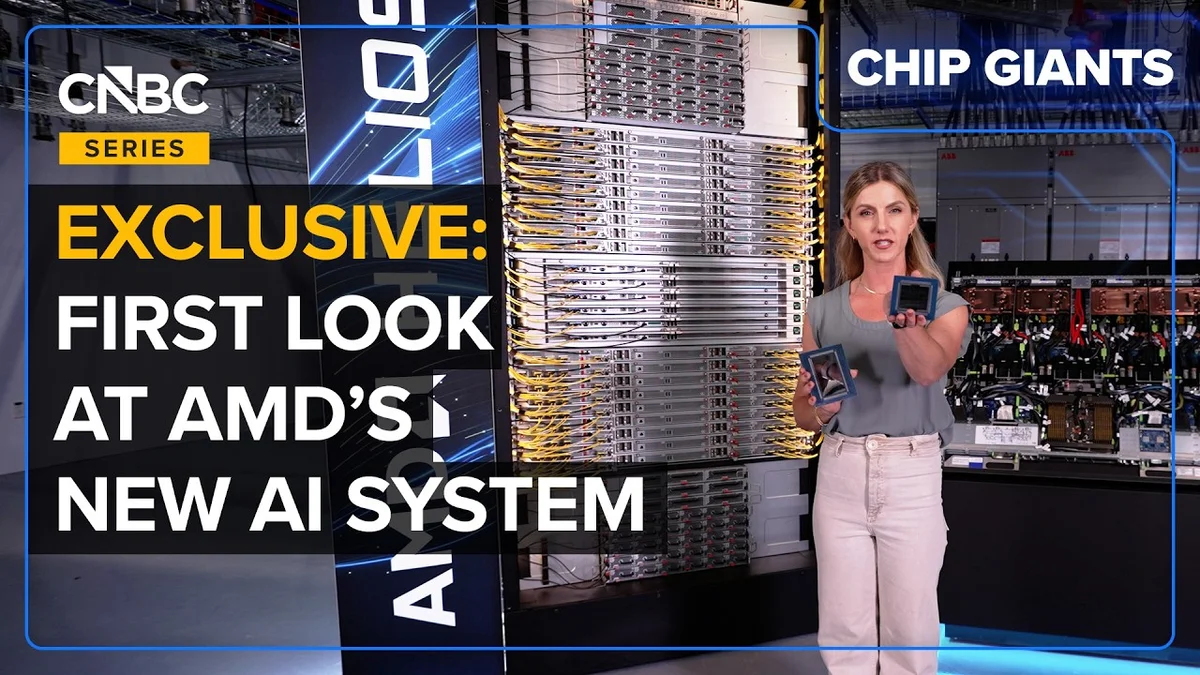 Katie Tarasov from CNBC stands in front of an AMD Helios AI system rack.