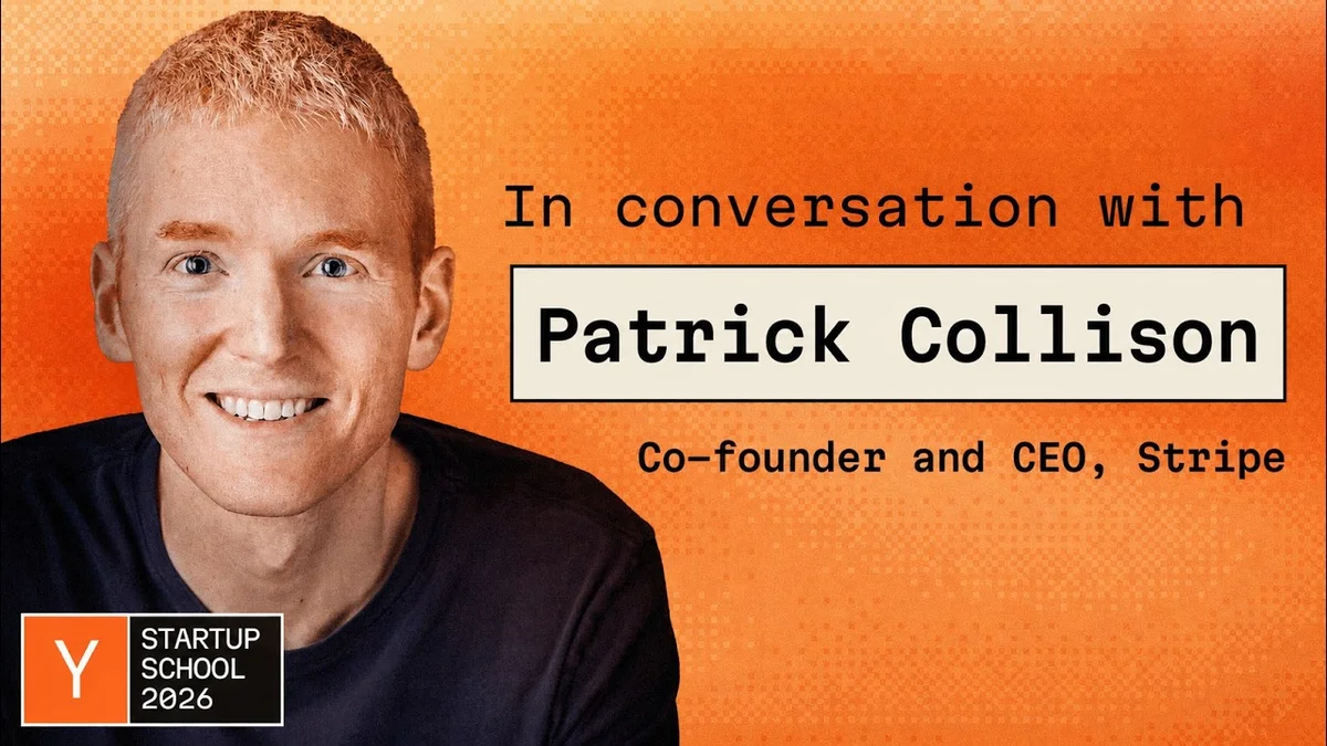 Patrick Collison speaking on stage at Y Combinator Startup School