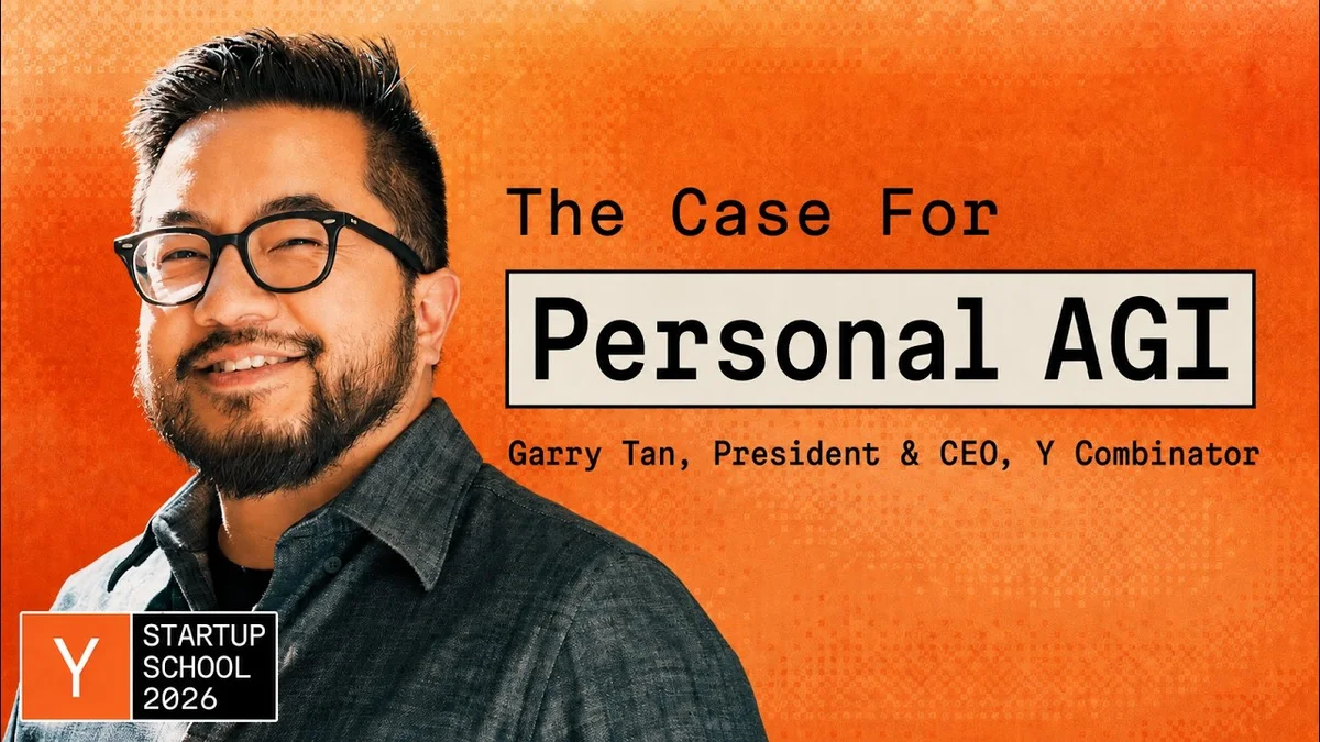 Garry Tan speaking on stage at Y Combinator Startup School