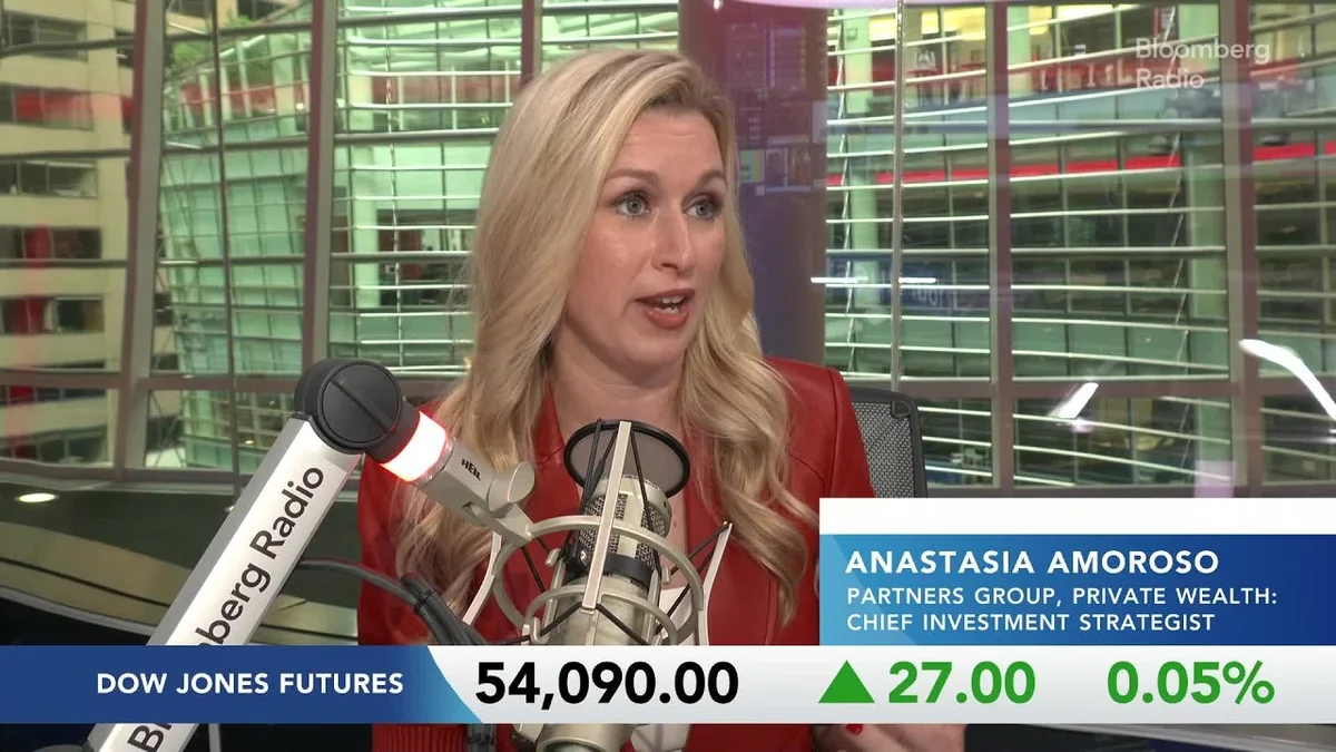 Anastasia Amoroso speaking at a Bloomberg Radio microphone