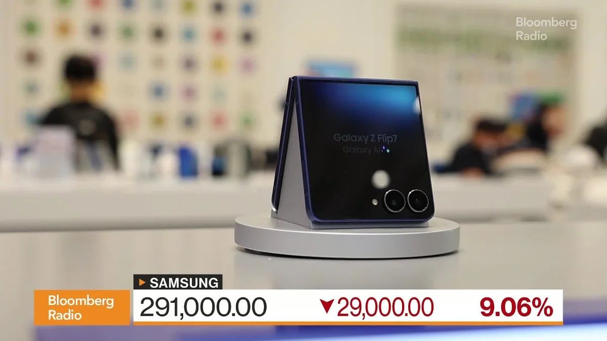 Close-up of a person using a Samsung Galaxy Z Flip 7 smartphone, displaying a game.
